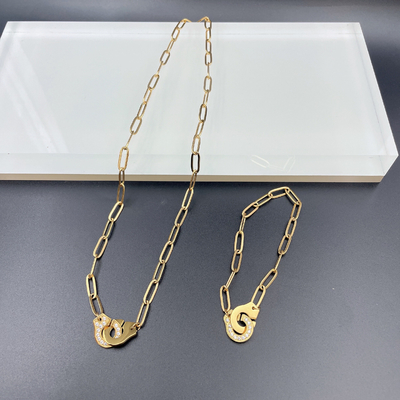 El más reciente de oro color de acero inoxidable arete, collar, brazalete conjuntos con Cnc Cz para la dama